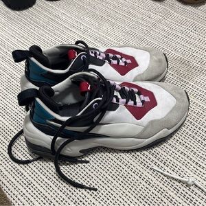Puma sneakers size women 8.5, men 7